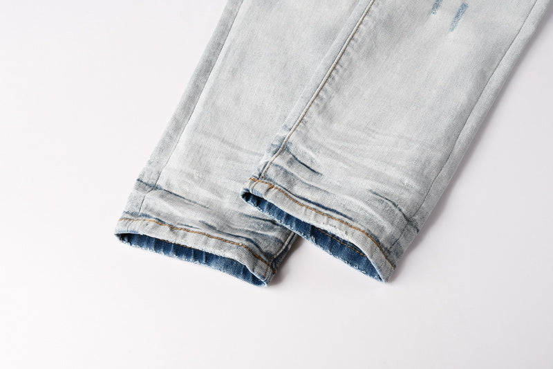 AMIRI Skinny Fit Jeans – Logo Patch Denim