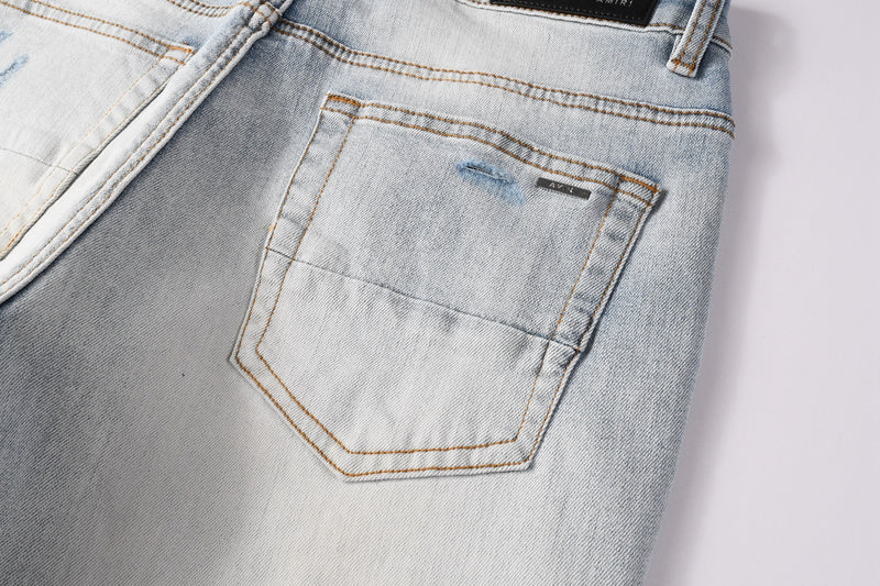 AMIRI Skinny Fit Jeans – Logo Patch Denim