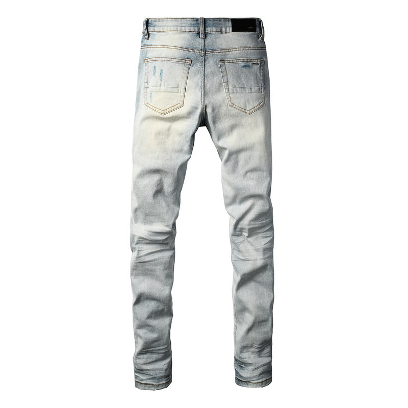 AMIRI Skinny Fit Jeans – Logo Patch Denim