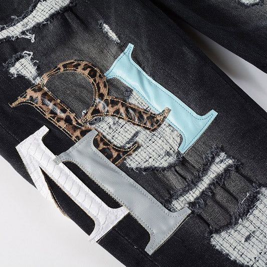 AMIRI Patchwork Slim Jeans – Full Logo Distressed Denim